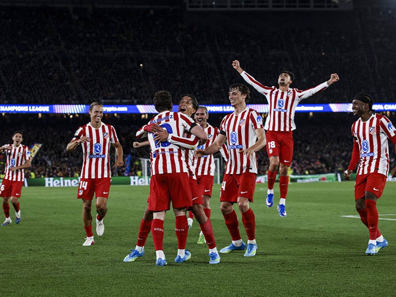 Atletico take control after win over 10-man Barcelona