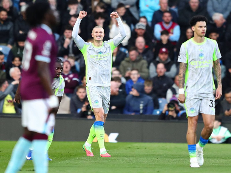 Manchester City climb to top while Burnley suffer relegation