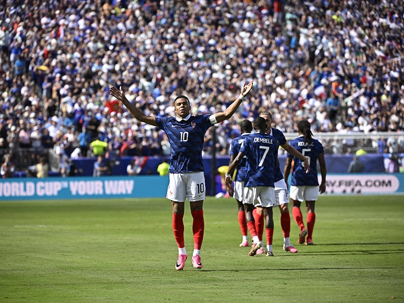 Mbappe double sets record as France overcome Senegal at World Cup opener