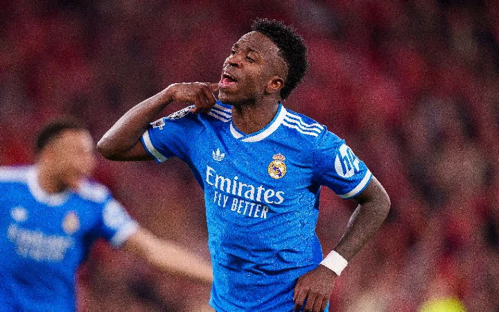Vinicius stunner gives Real Madrid 1-0 edge over Benfica as racism row halts play