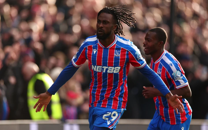 Late Guessand strike gives Palace vital win against 10-man Wolves