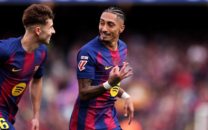 Raphinha hat-trick powers Barcelona past Sevilla to stay four points clear